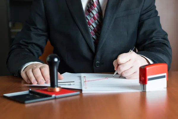 depositphotos_18409291-stock-photo-notary-public-in-his-office attestation qatar